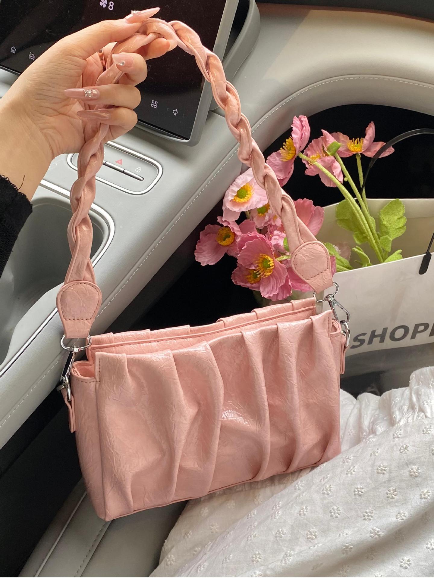 Bolso de cuero de cera de aceite de axila popular de este año para mujer 2025 nuevo bolso de nube plisada de estilo salvaje bolso de mensajero de un solo hombro de moda