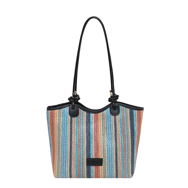 2026 nueva bolsa de tejido para mujeres de gran capacidad de viaje bolso de hombro portátil a rayas de moda bolso de mochila