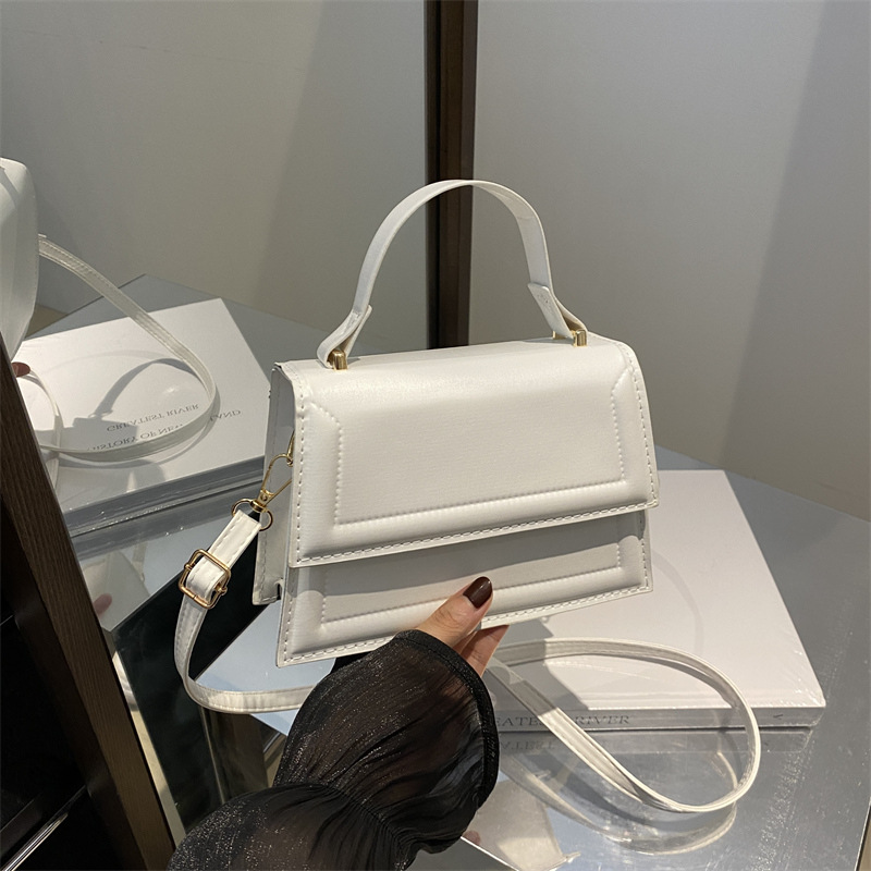 Calle casualidad de color sólido bolso de hombro 2024 nuevo tipo de bolso de mano casualidad nueva moda simple bolso de hombro