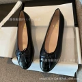 Black patent leather head