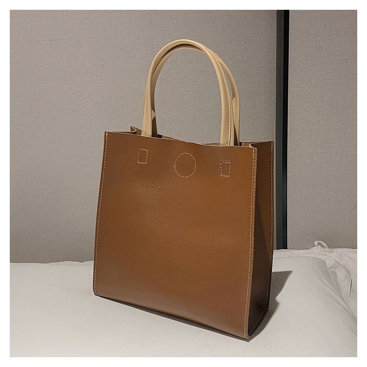 2024 New Bags Korean Version Versatile Commuting Bags Large Capacity Portable Tote Bag Temperament Popular Women’s Bag Vertical Style_voghion.com