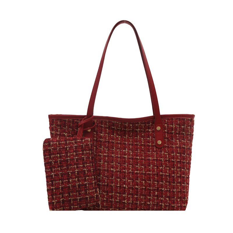 Bolso de mujer de moda de temperamento a cuadros de gran capacidad literaria 2025 primavera nuevo estilo coreano bolso de hombro de estilo occidental bolso de axila de moda