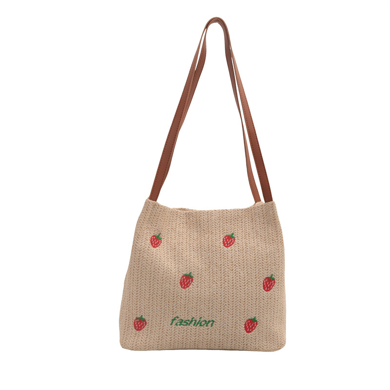 Bolsa de viaje de verano de gran capacidad para mujeres 2024 nuevo lindo bolso de tela de paja de fresas bolsa de trenzado de viaje de moda