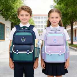 小学生书包护脊肩负1-3-6年级儿童防水轻便双肩包批发护脊书包