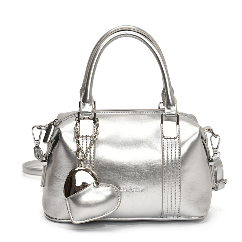 Transfronterizo de alto nivel sensación de viaje bolso de mano para mujeres 2025 nuevo estilo de moda universal bolso de hombro simple mochila casual