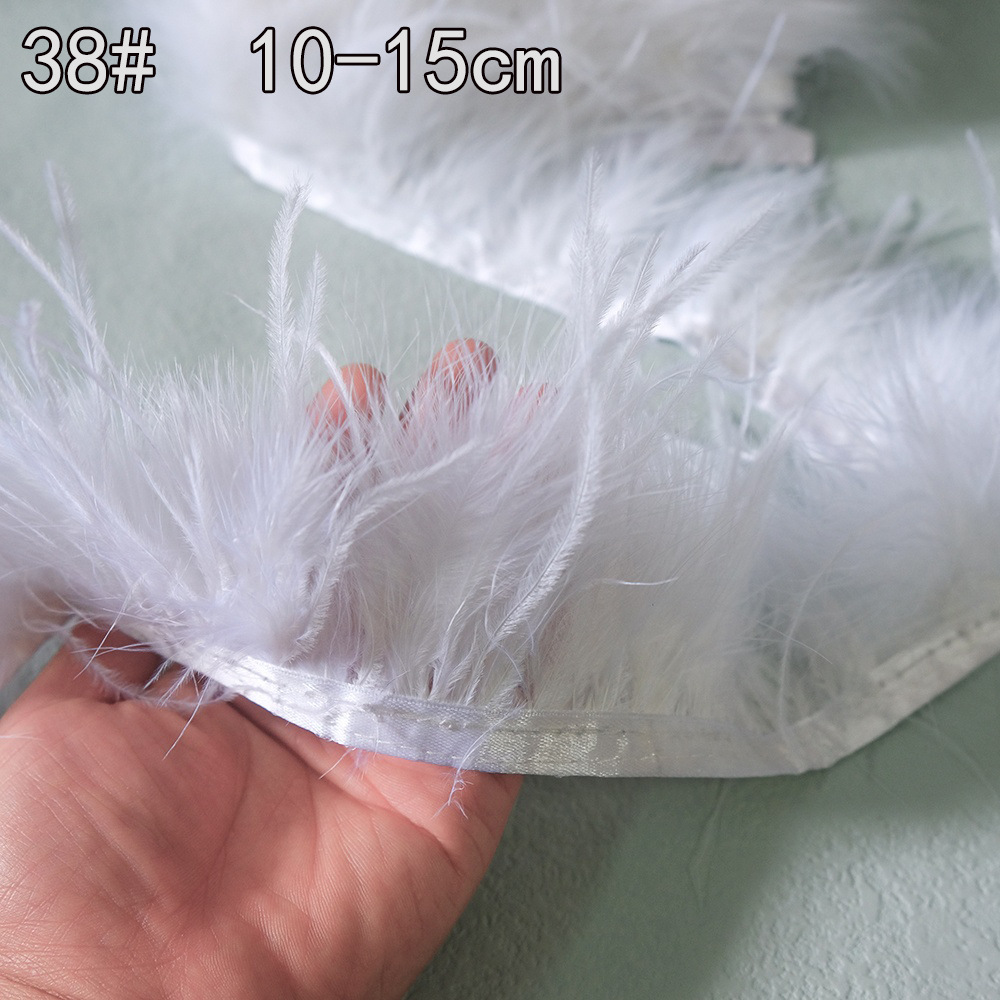 Colección de productos de plumas blancas al por mayor Accesorios de ropa de plumas hechos a mano de bricolaje Accesorios de plumas de ganso Material de plumas de pavo