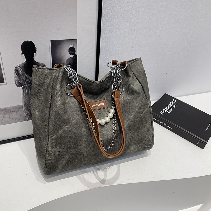 Capacidad de gran cadena de TOT 2024 nueva bolsa de moda de viaje de hombro de invierno para estudiantes universitarios superiores bolsa de clase