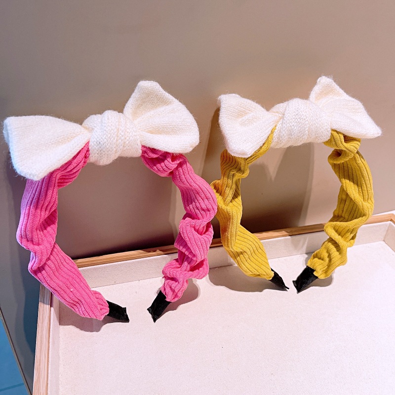 South Korea's Dongdaemun Autumn And Winter New Knitted Bowknot Contrasting Color Headband Western Simple Temperament Pressure Hair Sweet Headband display picture 11