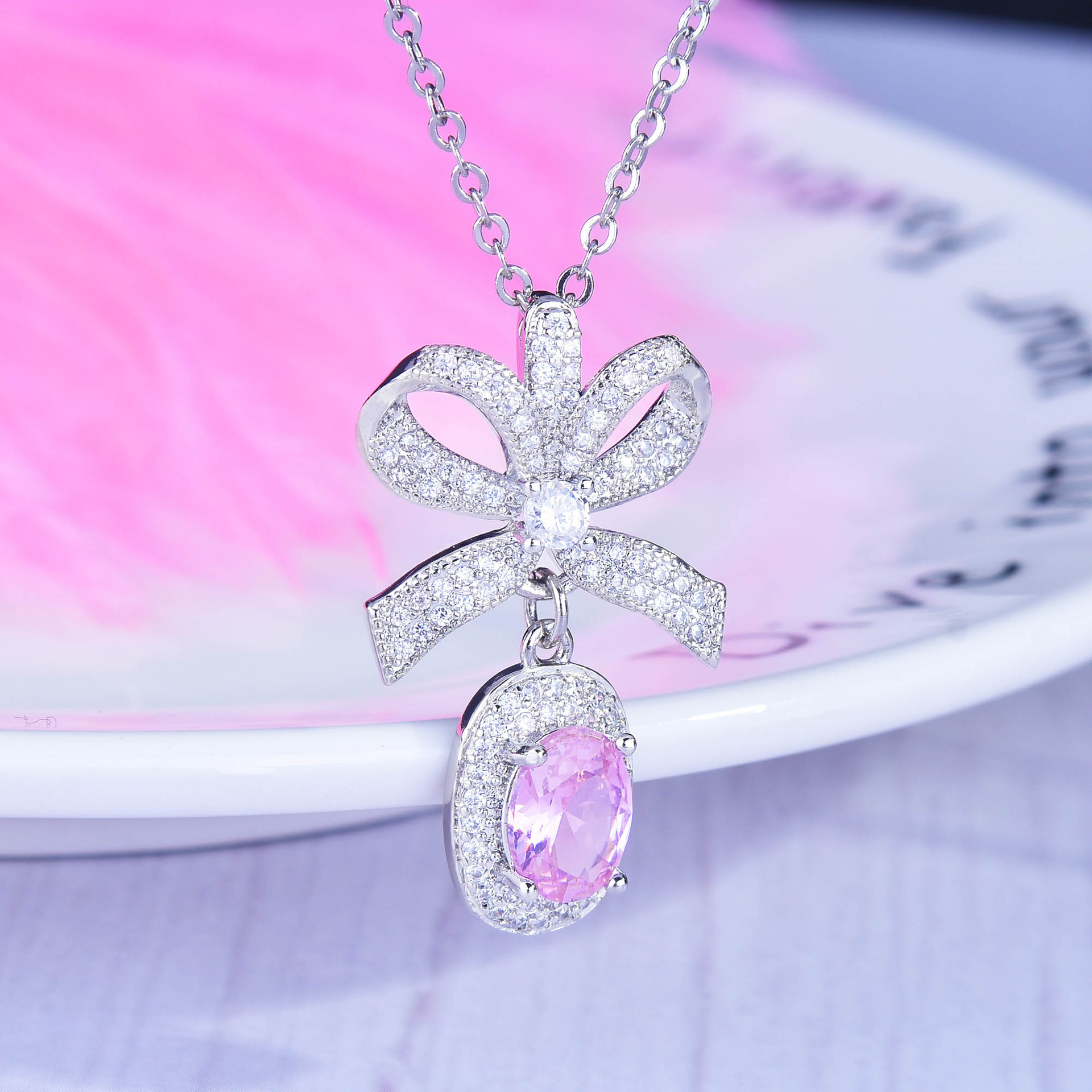 fashion three-dimensional pink diamond bow pendant copper necklace