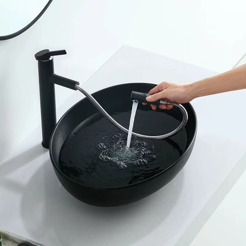 Hotel blanco y negro Mesa lavabo cuenca hogar oval lavabo de cerámica lavabo único balcón lavabo cuenca