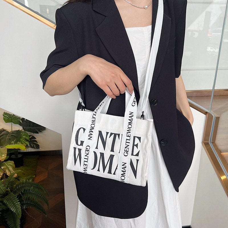 Fashionable letter canvas small bag for women, 2024 new style casual and stylish crossbody phone bag for going out, wholesale undefined