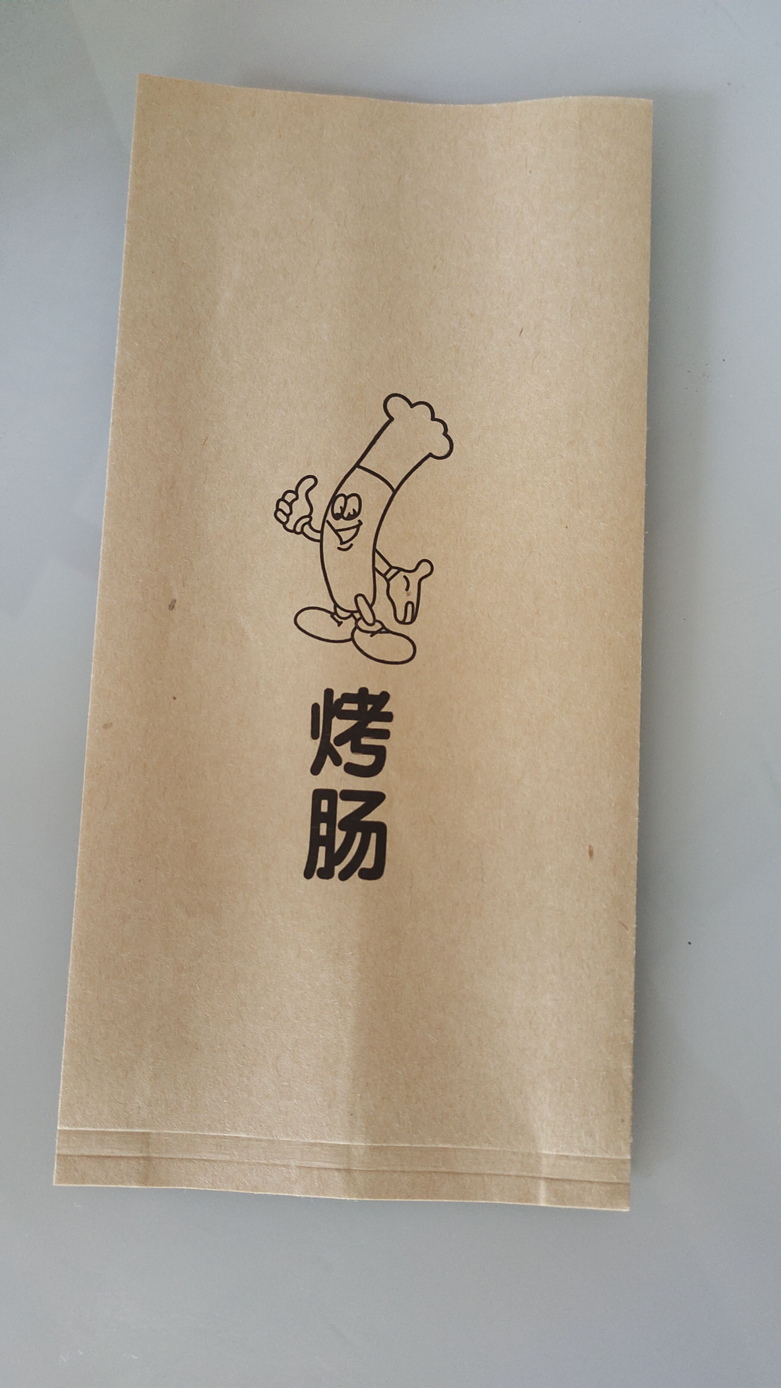 Bolsa de salchicha asada, almidón volcánico, bolsa de salchicha asada crujiente, pastel de arroz, jamón, perros calientes, bolsa de embalaje, papel kraft a prueba de aceite, fijación