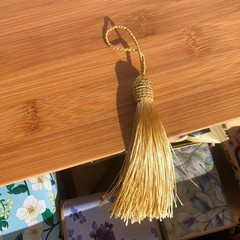 風呂敷の包みの包みの布の部品は穂の腰を飾って扇子を密封します。