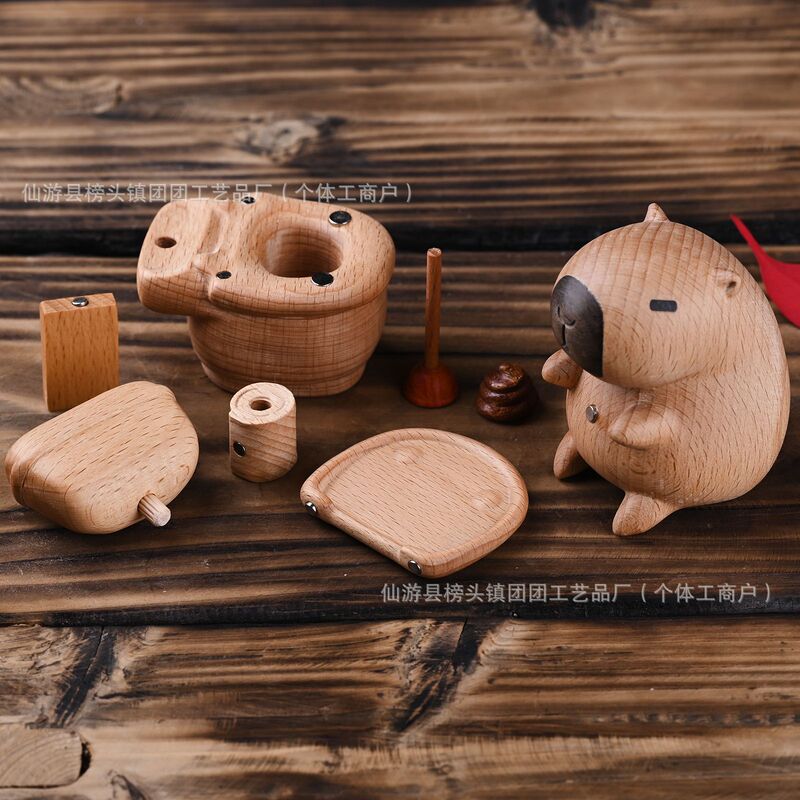カピバラ便器の実木彫刻磁気はかわいいアイデアを吸収します。|undefined