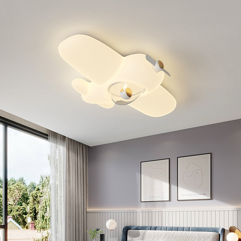 Luz de lujo ligera de la habitación de niños en línea chico moderno y minimalista luz de dormitorio avión creativo inteligente LED luz de techo nuevo