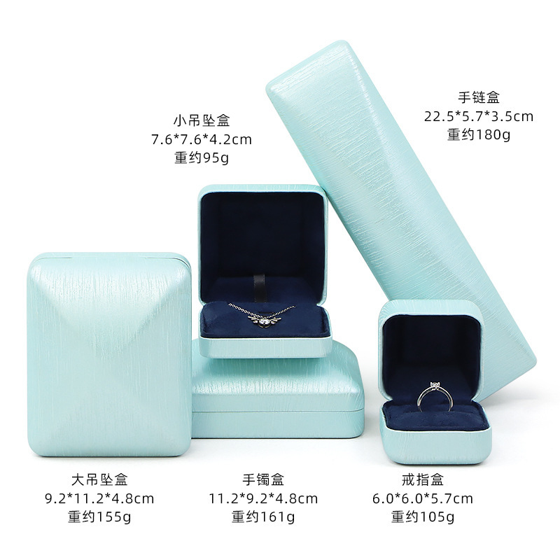 鏡のハイエンドの多角形PU木目の高級ジュエリーの鉄の箱のブレスレットのブレスレットのペンダントの指輪のアクセサリーの包装|undefined