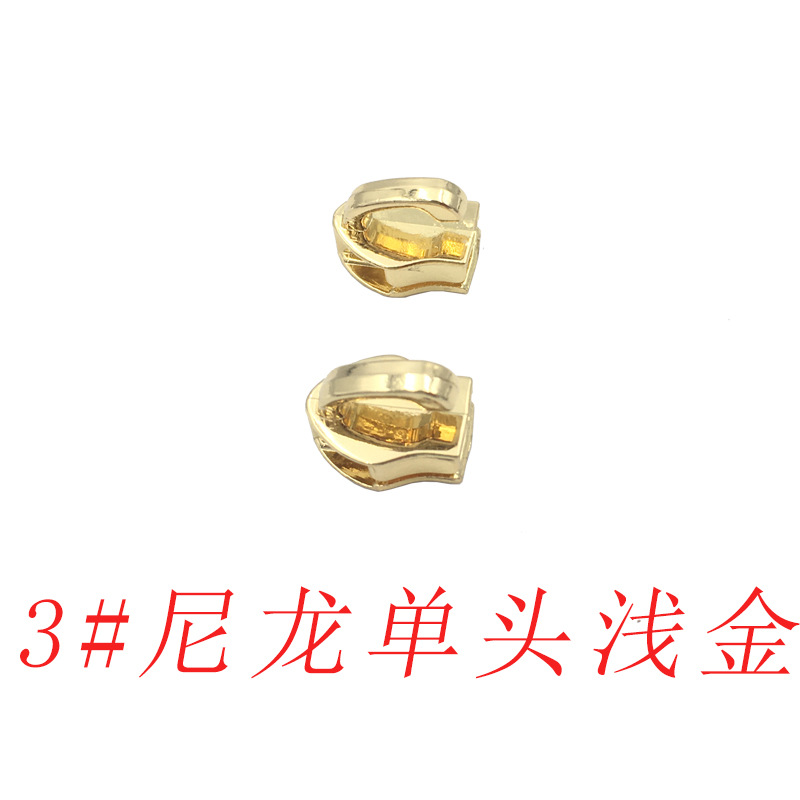 En stock al por mayor N ° 3 N ° 5 N ° 10 dientes de goma de nylon elefante nariz de una sola cabeza equipaje cabeza colgante chapado rodillo chapado multi-color