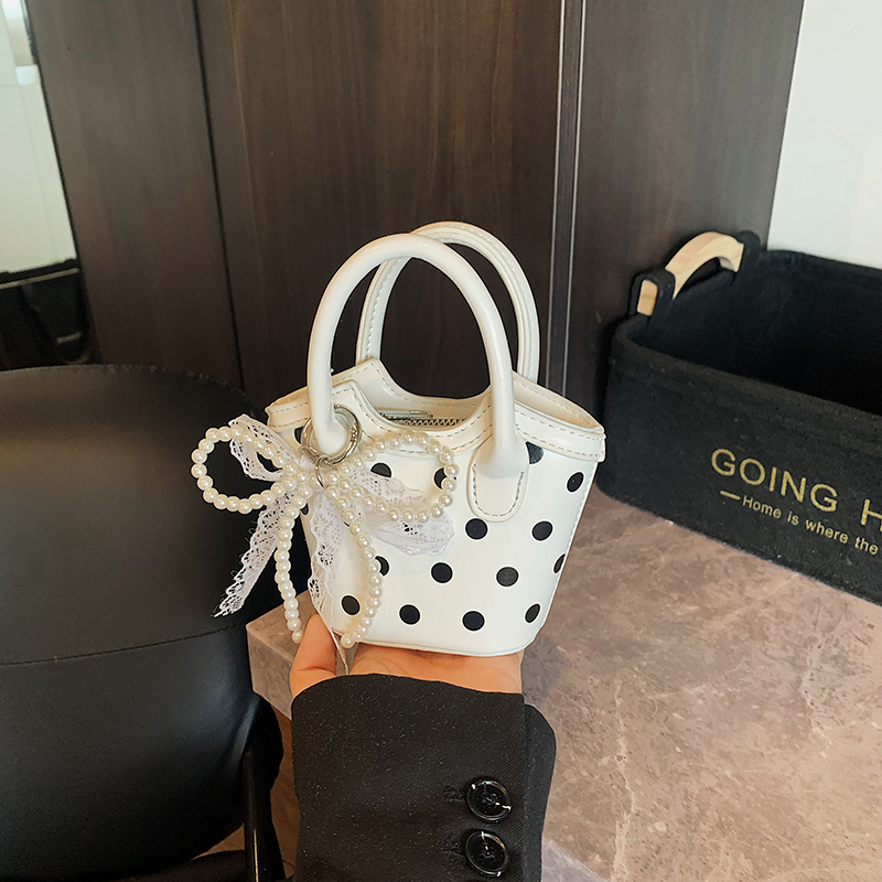 Bolso de moda coreano 2025 verano nuevo bolso femenino diseño de nicho bolso de hombro mini bolso de mensajero de lunares marea