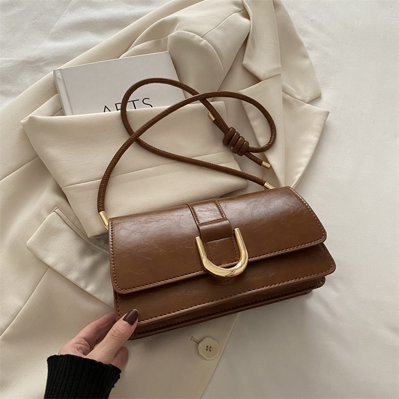 Diseño francés de nicho retro bolso debajo de la axila para mujeres 2024 otoño y invierno nuevo paquete de mano de hombro de alta calidad