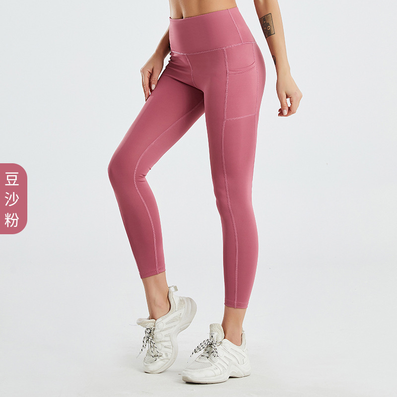 Amazon tamaño europeo pantalones de yoga transfronterizos bolsillo lateral de las mujeres melocotón cintura alta Levantamiento de cadera medias de fitness europeas y americanas