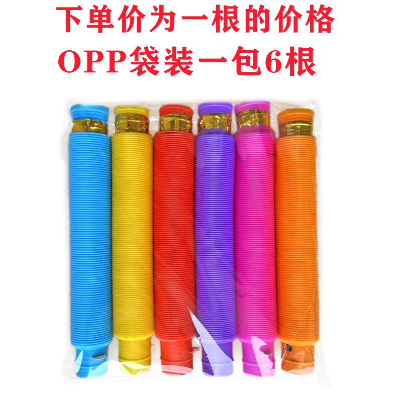 Flash transfronterizo fuelle de ventilación descompresión de luz LED tubo de agua pop tubo de descompresión luminosa tubo telescópico al por mayor