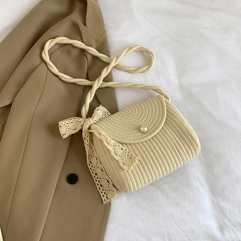 Bolso de tejido para mujeres 2024 nuevo verano cordón trenzado mochila de hombro bolso de hombro pequeño arco encantador