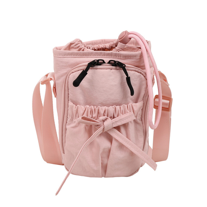Bolso de teléfono móvil de moda coreana 2025 verano nuevo bolso femenino lindo lazo bolso de hombro bolso de mensajero de lona casual