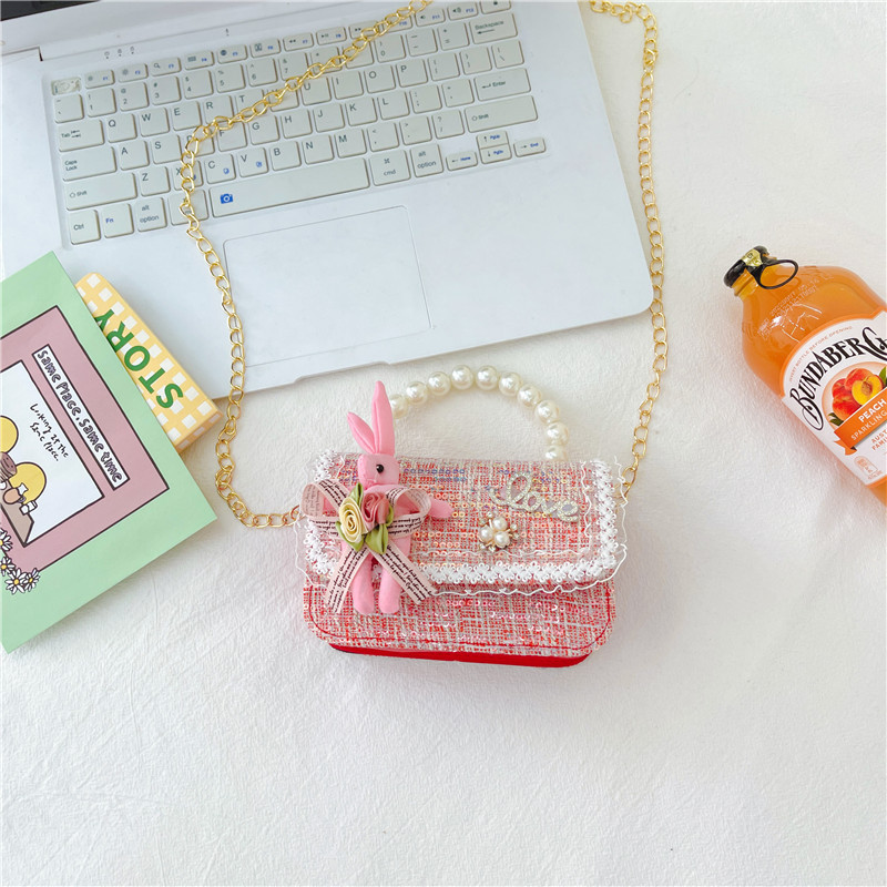 Estilo coreano de los niños bolsa pequeña de Kindergarten niñas mini bolso 2023 nueva cadena de conejito de dibujos animados bolsa de hombro