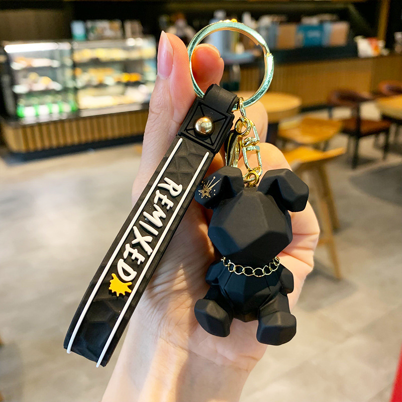 Portachiavi per auto con zaino e macchina a forma di coniglio in resina, con artiglio, ciondolo di celebrità di Internet_voghion.com