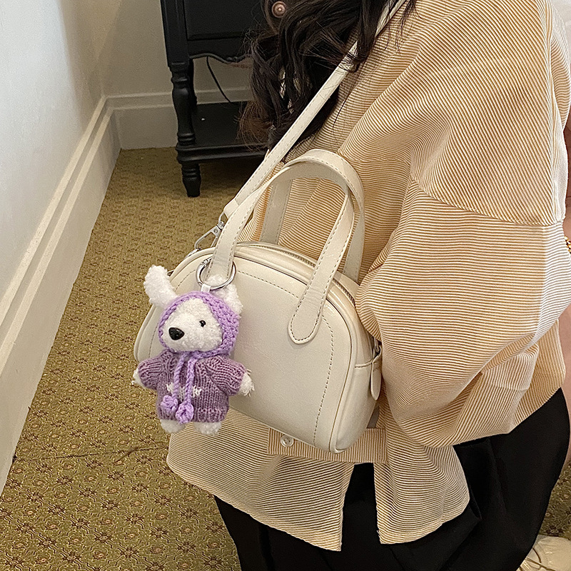 Bolsa de conchas para mujeres 2026 nuevo tipo de bolso de hombro portátil de viaje universal nicho de diseño diario bolso de mano