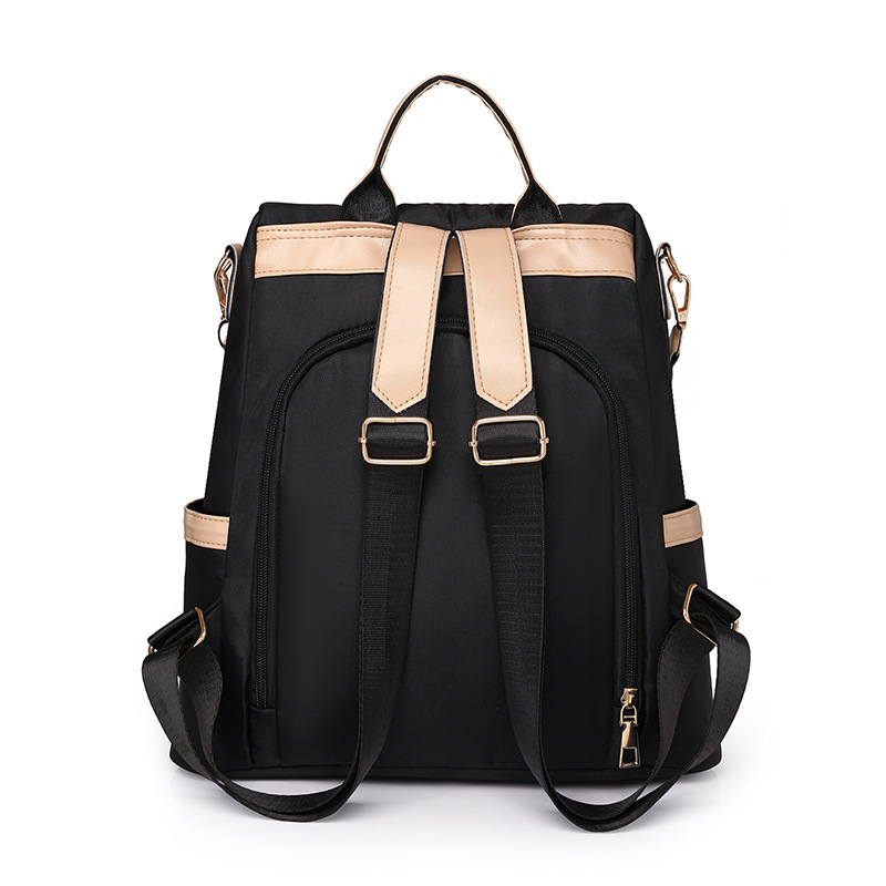 Verano de alto valor nuevas señoras nylon antirrobo mochila de moda remache multifunción mochila de viaje al por mayor marea