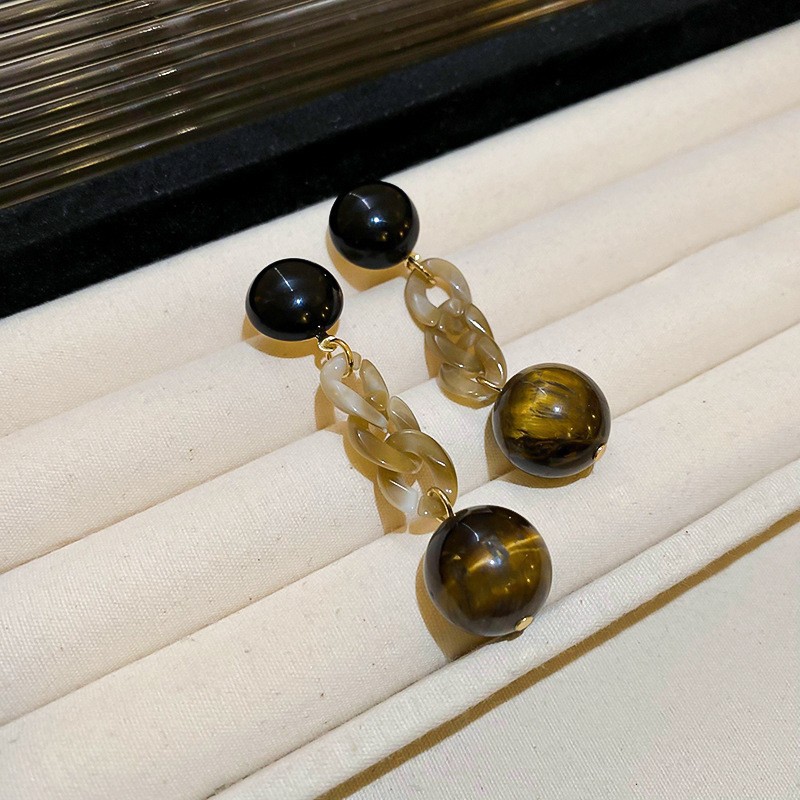 Pendientes de ojo de tigre artificial de color café Maillard con aguja de plata Pendientes simples y de moda de todo fósforo Pendientes ligeros de lujo de alta gama