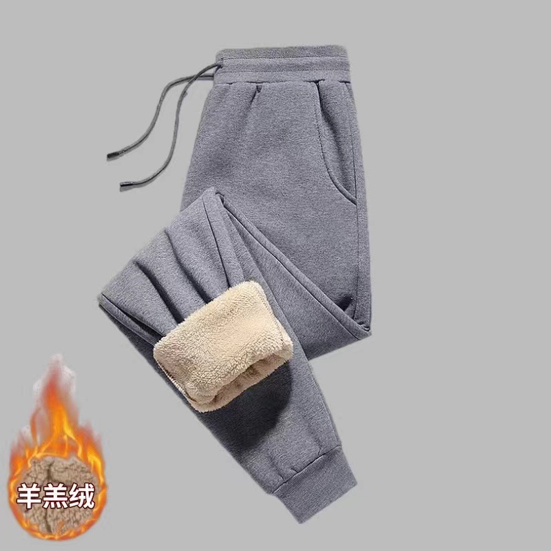 En stock pantalones de invierno de los hombres forrados de lana engrosada pantalones casuales estilo coreano de moda recta suelta más el tamaño de todos los deportes a juego hombres