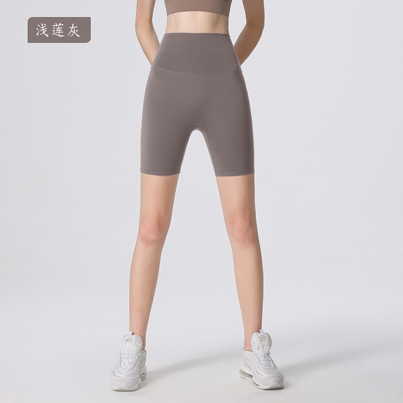 Nuevos deportes de Yoga de cintura alta desnuda sensación de no vergüenza línea de piel-friendly cadera levantamiento vientre contratación no caída de la aptitud de las mujeres de tres puntos cortos