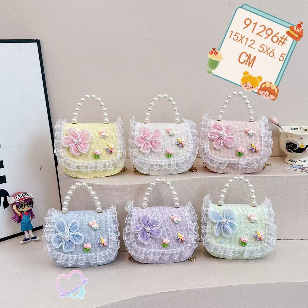 Nuevo comercio exterior pequeña fragancia niñas hombro mochila de moda perla arco bolsos de niños bolsos de cambio de dibujos animados