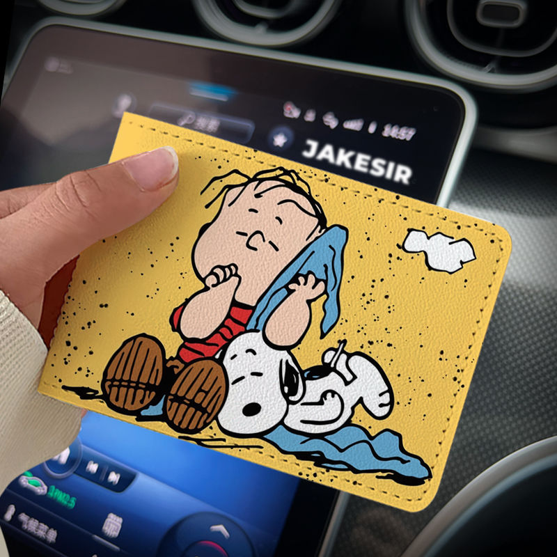 Lindo Snoopy coche Licencia de Conducir cubierta protectora cubierta de cuero vehículo de motor Certificado de licencia de conducir dos en uno