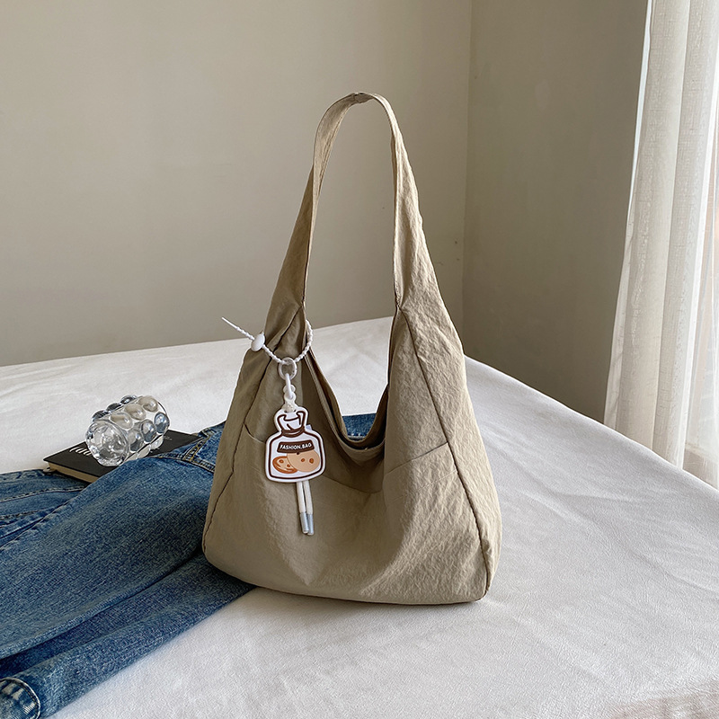 Bolsa de lona coreana ins2024 verano nueva moda ocio bolso de hombro para estudiantes universitarios