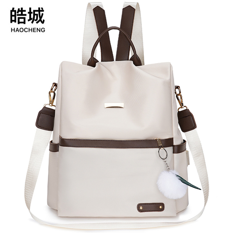 Fábrica al por mayor 2023 nueva mochila antirrobo casual para mujer moda contraste color al aire libre ligero mochila de doble uso marea