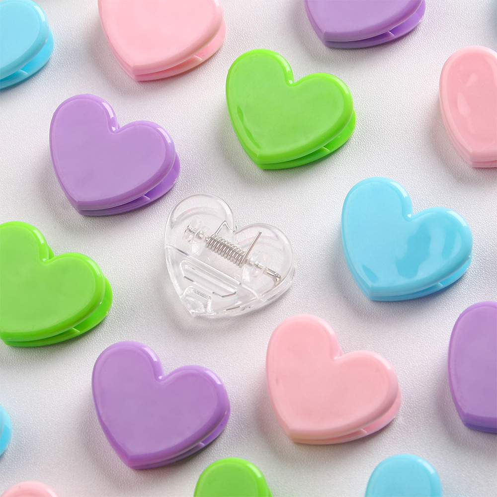 Clip de plástico de amor creativo de color en el corazón de una chica de viento fotos de almacenamiento de decoración de carpetas de oficina de estudio
