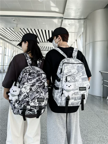 Schoolbag male college student large capacity high school junior high school student fashion brand personality graffiti backpack female ins