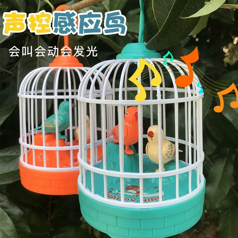 Игрушечная птичка в клетке звук и свет
