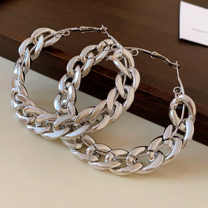 Pendientes de alta gama de lujo ligero transfronterizo de aguja de plata de galvanoplastia de oro real, pendientes de personalidad de nicho, pendientes de alta gama de moda al por mayor