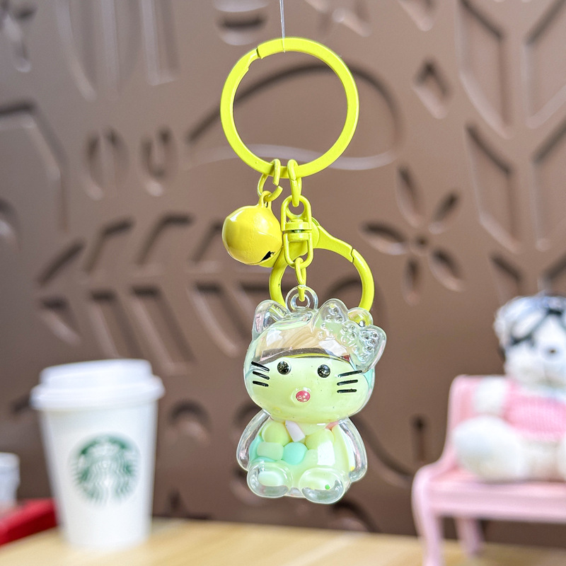 Caricatura en aceite líquido arena flotante botella mochila llavero delicado colgante accesorios accesorios máquina de muñecas pequeños regalos al por mayor