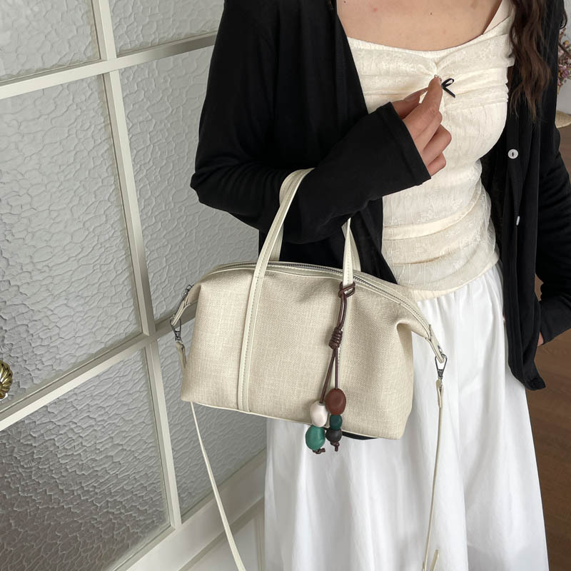 Bolsa de mano de gran capacidad de viaje coreano para mujeres 2026 nueva moda de verano simple bolsa de hombro retro