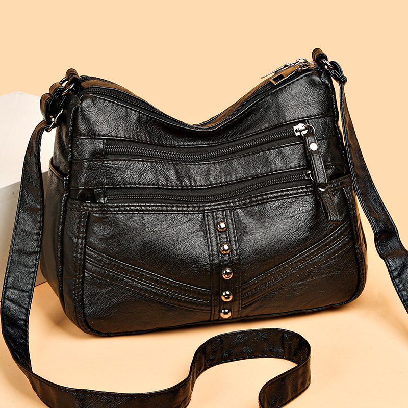 Nueva bolsa de mensajero de cuero suave de alta calidad para mujer transfronteriza nueva bolsa de hombro de cuero retro con bolsillo grande y múltiples compartimentos