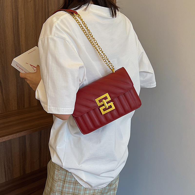 Primavera retro bolsos de mujer 2024 nuevo popular explosivo bolso de cinturón de cadena de moda bolso de hombro