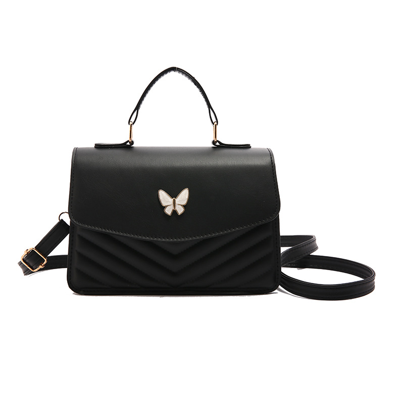 Bolso bordado de color sólido otoño y invierno 2024 nuevo estilo retro bolso de moda simple bolso de mariposa de moda
