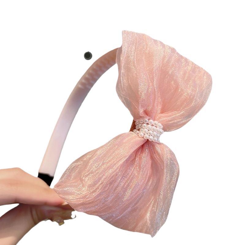 子供のカチューシャの女の子の髪飾り赤ちゃんのピンクの蝶結びの髪締めの女の子の髪飾り