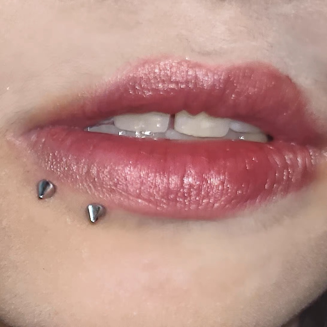 Pointed labret stud close-up product detail
