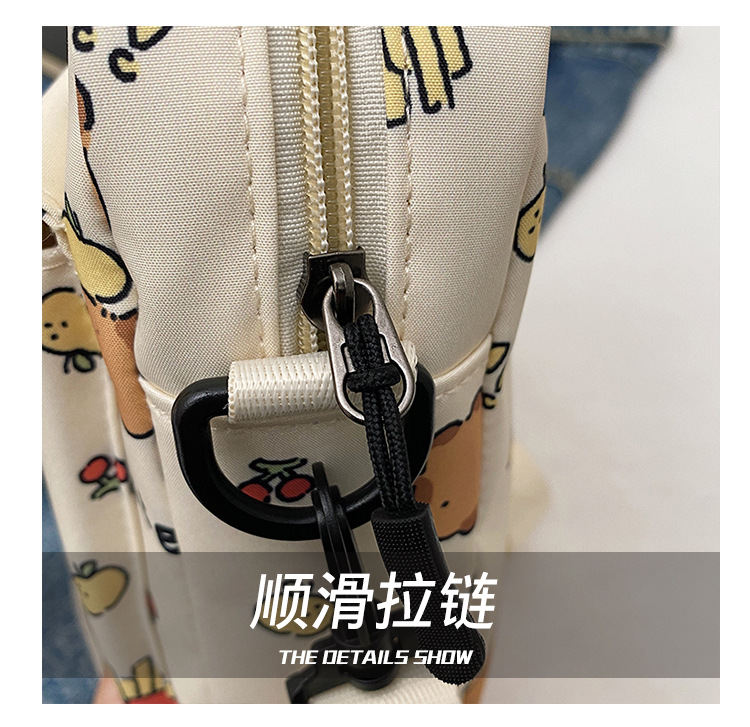 Cartoon animal print, many pockets, few bags, single-shoulder bag for girls, large capacity, cute graffiti, lightweight schoolbag for primary and middle school students Item Picture